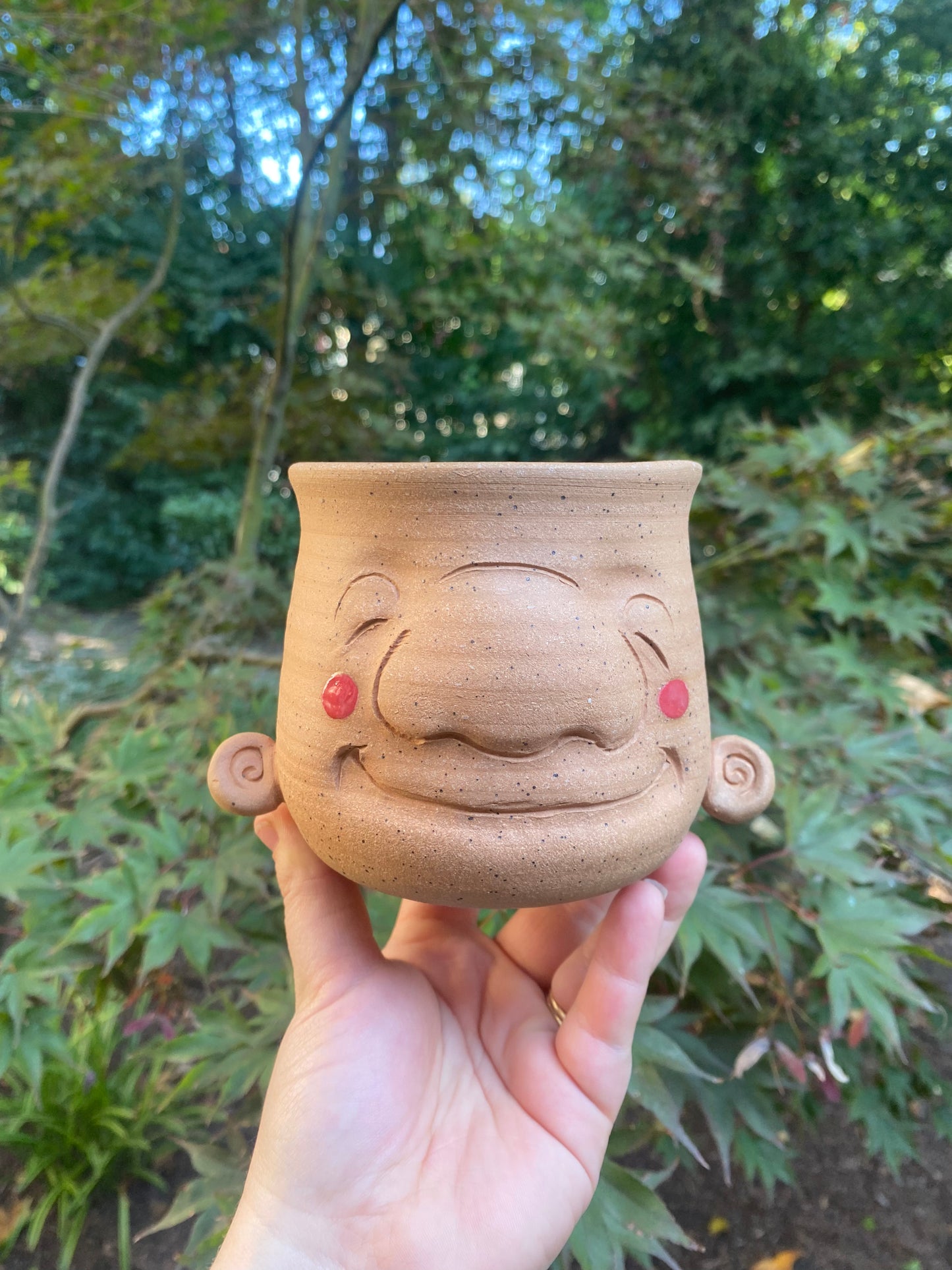 Tan Sculpted Planter with a Face