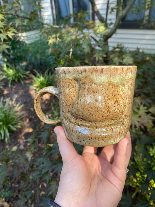 Short Speckled Mug with a Face