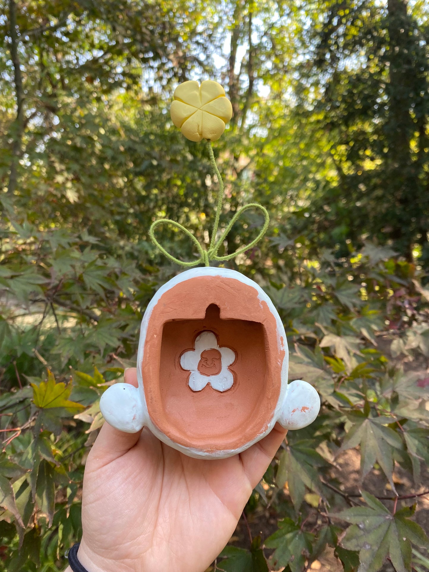 Light Blue Wall-Hanging Mask with a Flower